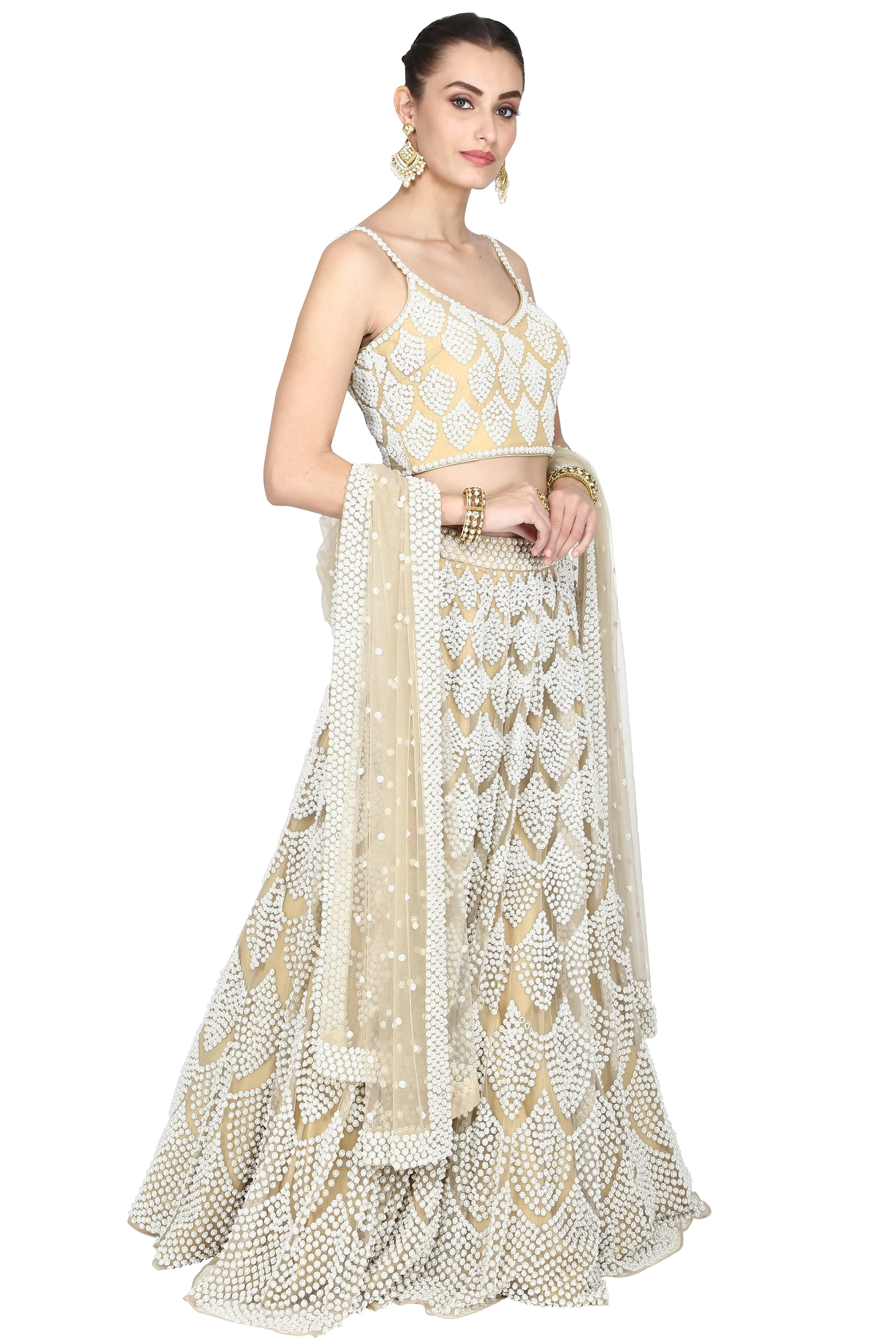 Beige lehenga set.