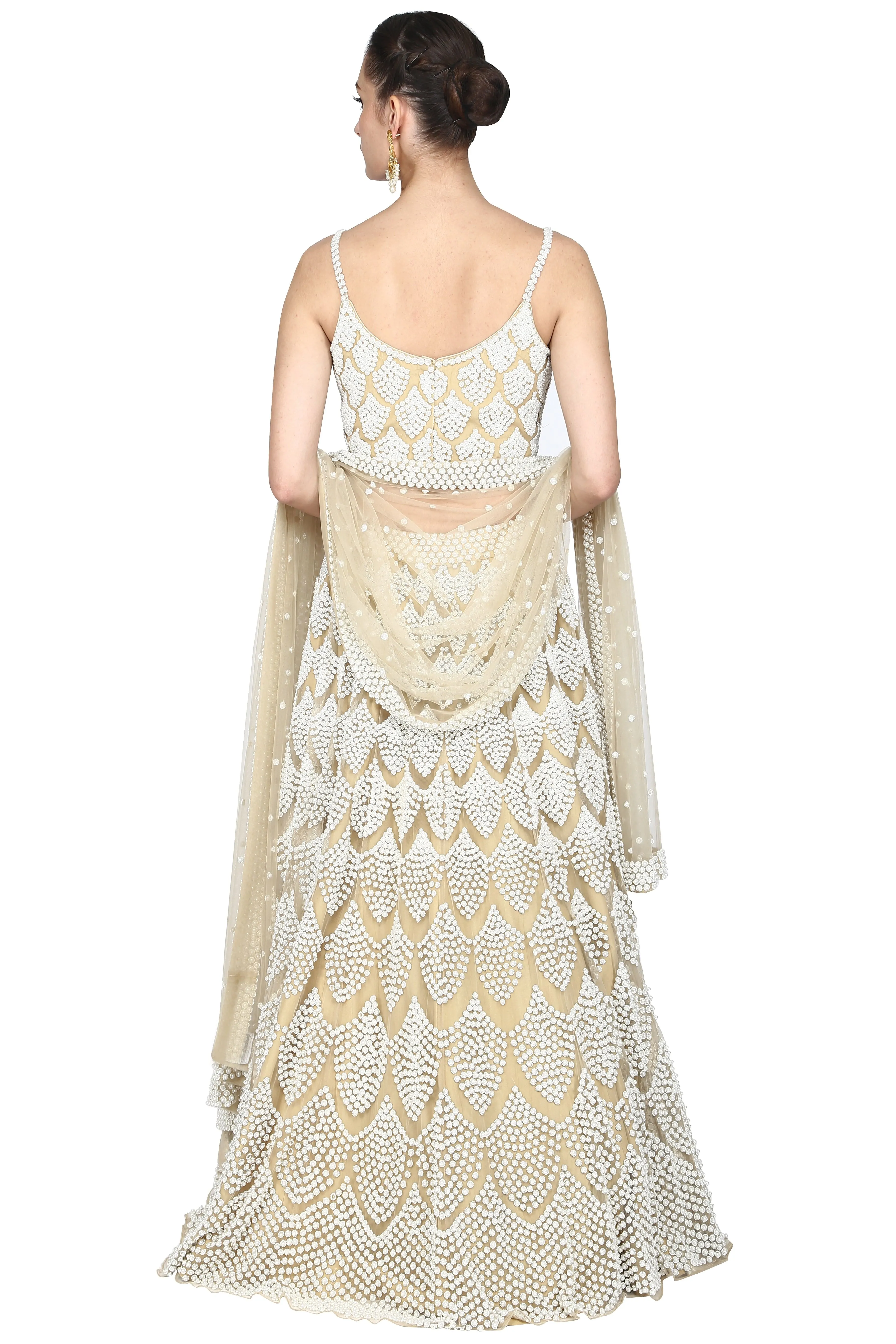 Beige lehenga set.